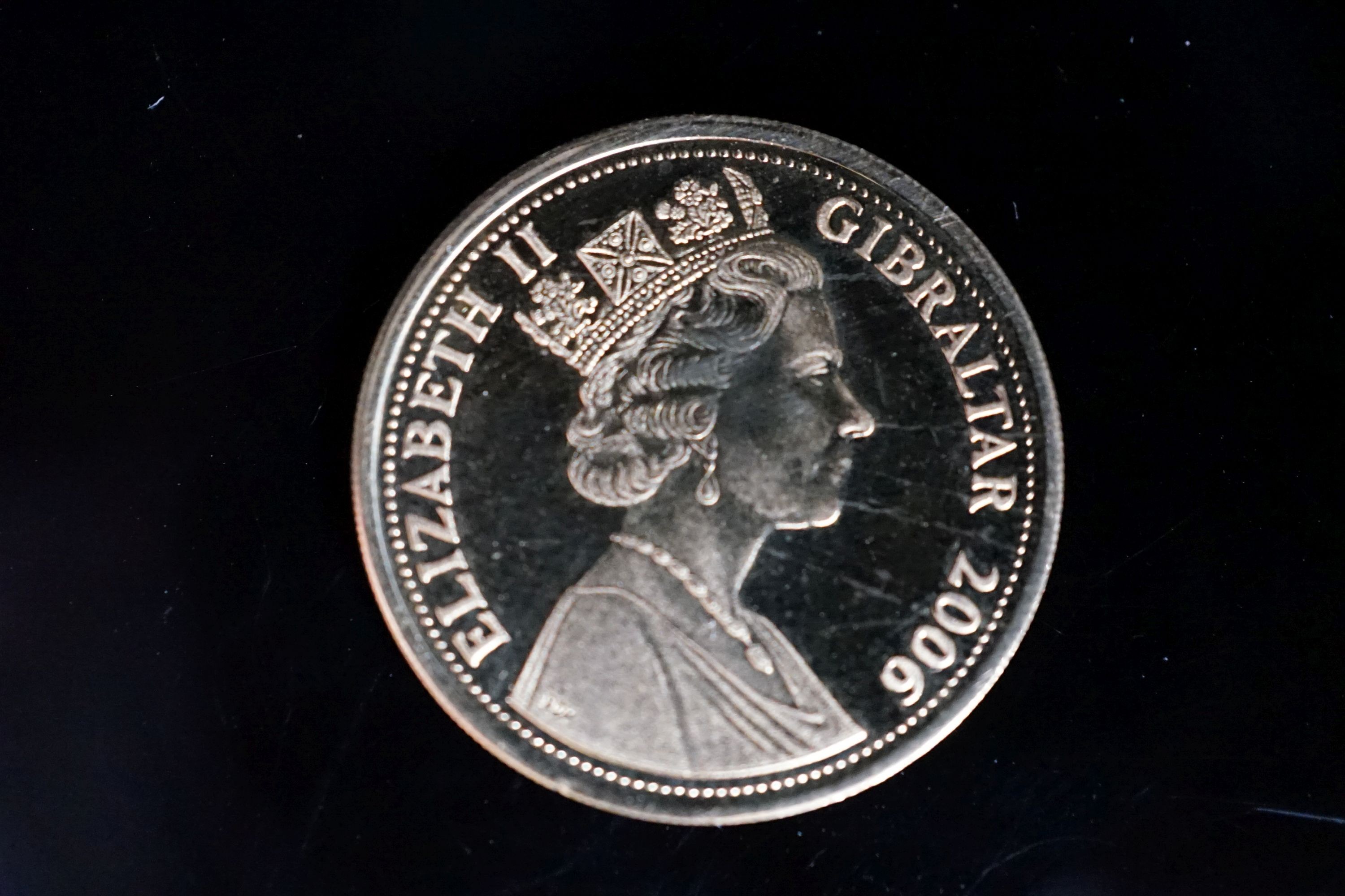 A 2006 Elizabeth II Gibraltar gold one pound coin.